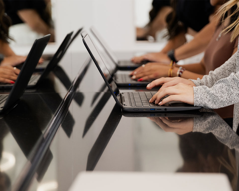 students on laptops