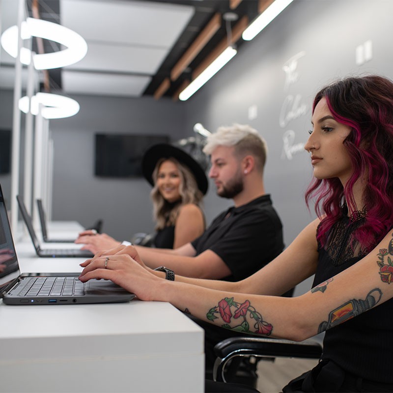 cosmetology students using CIMA
